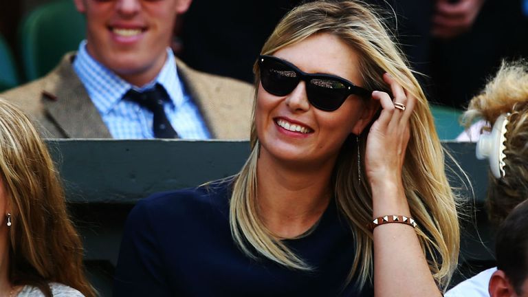 Maria Sharapova of Russia the girlfriend of Grigor Dimitrov of Bulgaria watches his semi-final match against Novak Djokovic