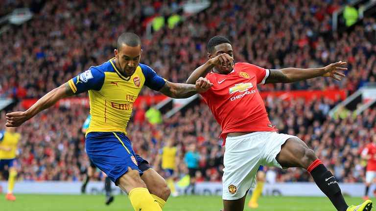 Theo Walcott's cross was deflected in by Tyler Blackett to pull Arsenal level 