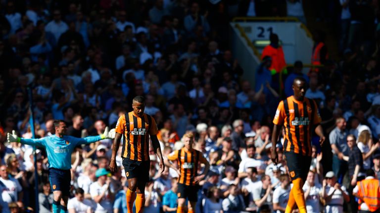 A dejected Tom Huddlestone looks to the ground