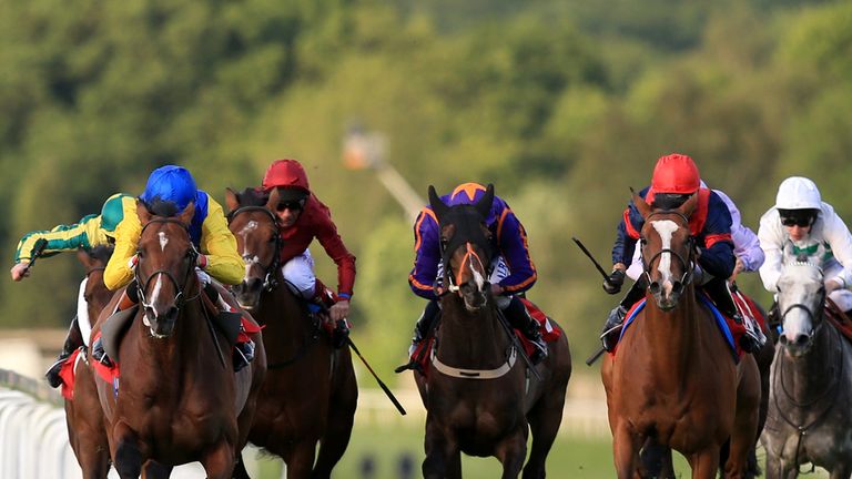 Vent de Force (left) ridden by Richard Hughes on the way to winning The Cantor Fitzgerald Investment Trusts Henry II Stakes at Sandown Racecourse. PRESS AS