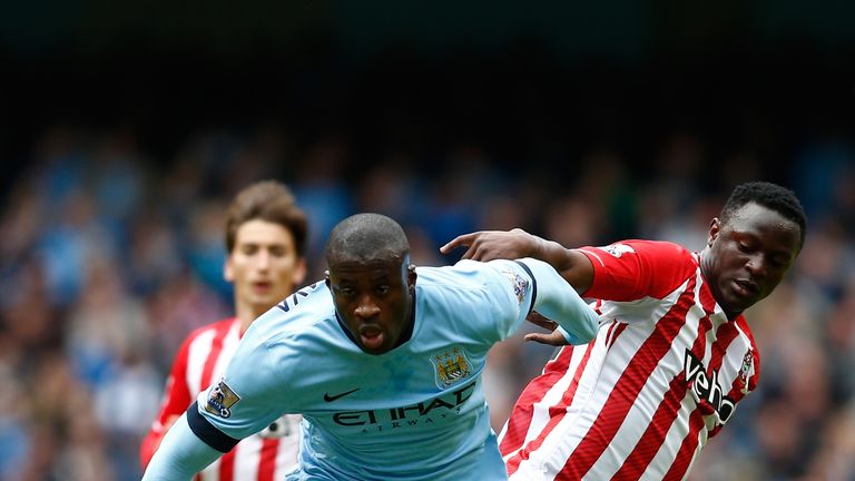 Yaya Toure of Manchester City and Victor Wanyama of Southampton compete for the ball