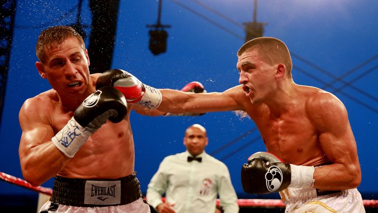 HULL, ENGLAND - JULY 13:  Lee Selby (R) connects with Viorel Simion during their International Featherweight Championship bout at Craven Park Stadium on Ju