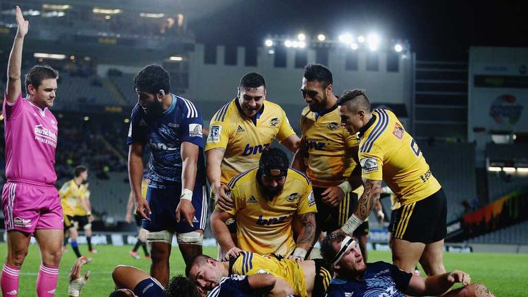 Dane Coles plunges over for a Wellington Hurricanes try against the Auckland Blues
