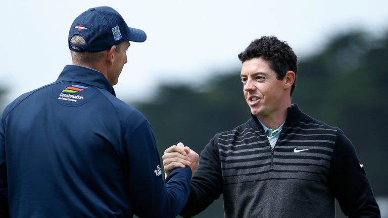 Rory McIlroy of Northern Ireland shakes hands with Jim Furyk after winning their semi final match to advance to the final in the WGC. 