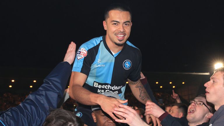 Wycombe Wanderers' Nicholas Yennaris is lifted by celebrating fans during the Sky Bet League Two, Play Off Semi Final, Second Leg at Adams Park, Wycombe.