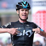 Chris Froome celebrates victory in the final stage of the Criterium du Dauphine