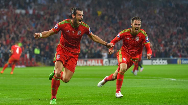 Gareth Bale celebrates opening the scoring for Wales in their key qualifier against Belgium