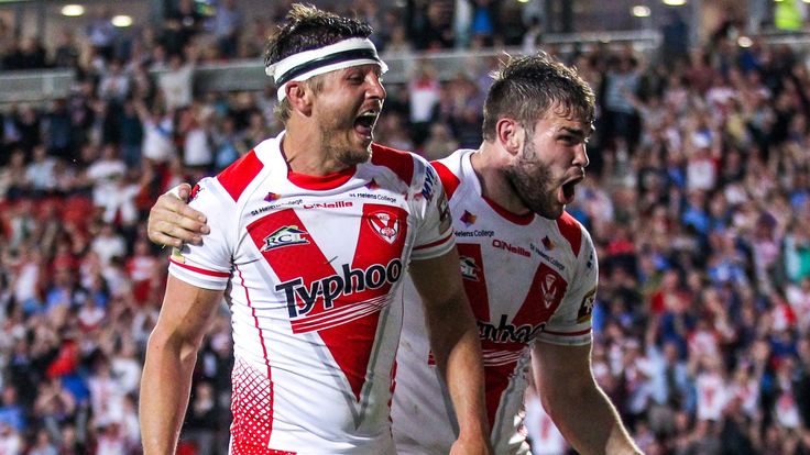 St Helens' Jon Wilkin (L) celebrates his try with Alex Walmsley (R).