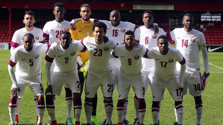The Qatar national team pose for a photo ahead of their 1-1 draw with Northern Ireland