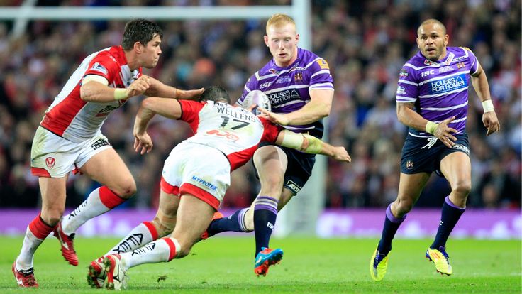 St Helens' Paul Wellens tackles Wigan's Liam Farrell during the 2014 Grand Final