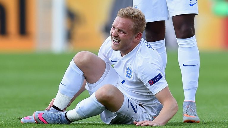 Alex Pritchard: Lies injured during the clash with Sweden