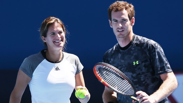 Andy Murray of Great Britain talks with coach Amelie Mauresmo during a practice session ahead of the 2015 Australian Open