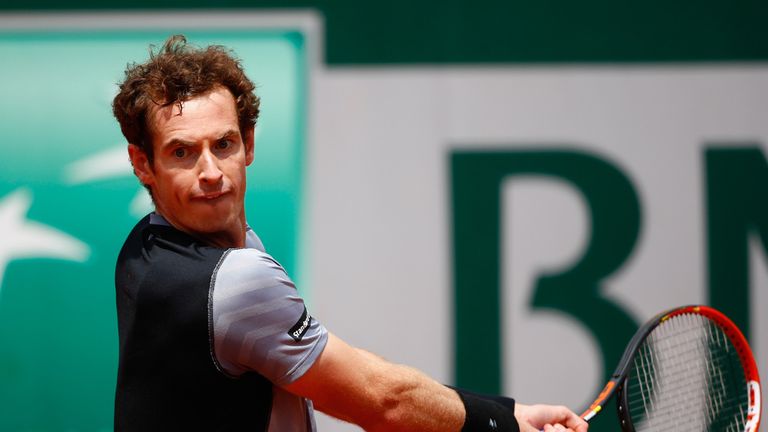 Andy Murray returns a shot in his Men's Singles match against Jeremy Chardy