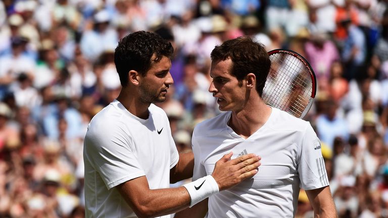 LONDON, ENGLAND - JULY 02:  Andy Murray of Great Britain and Grigor Dimitrov of Bulgaria after their Gentlemen's Singles quarter-final match on day nine of
