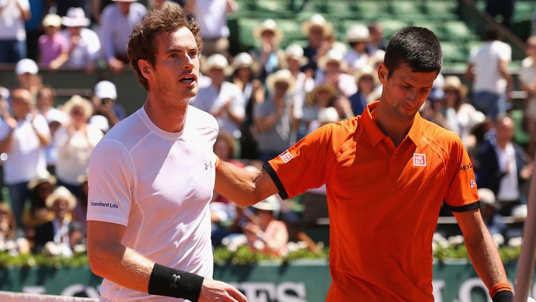 Andy Murray (L) congratulates Novak Djokovic