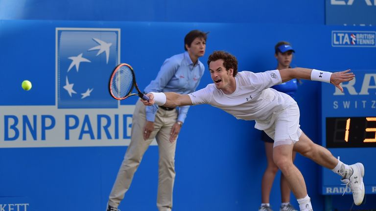 Andy Murray stretches for a return
