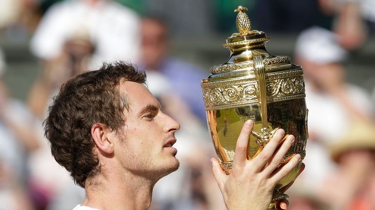 LONDON, ENGLAND - JULY 07:  Andy Murray of Great Britain poses with the Gentlemen's Singles Trophy following his victory in the Gentlemen's Singles Final m