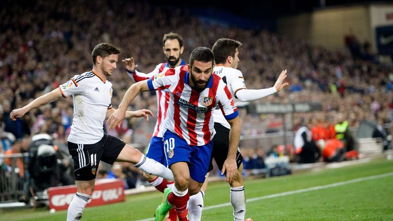 Arda Turan demonstrates his dribbling abilities against Valencia