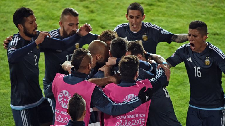 Argentina's forward Sergio Aguero celebrates with teammates