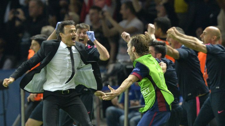 Barcelona's coach Luis Enrique (L) celebrates at the end of the UEFA Champions League Final football match between Juventus and FC Barcelona
