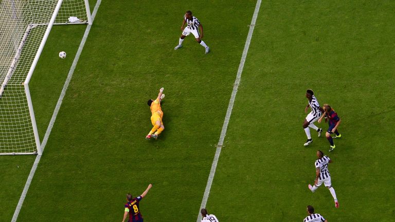 Ivan Rakitic (R) opens the scoring for Barcelona during the UEFA Champions League Final against Juventus