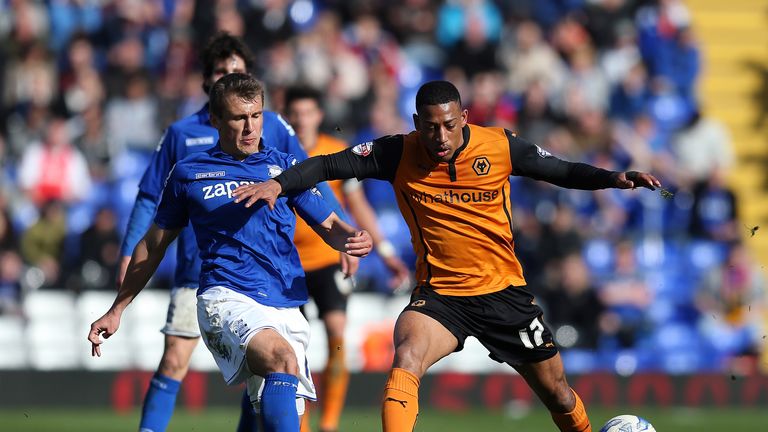 Robert Tesche of Birmingham City competes with Rajiv Van La Parra of Wolverhampton Wanderers