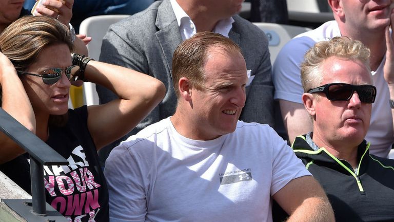 Amelie Mauresmo (L), fitness trainer Matt Little (C) and coach Jonas Bjorkman (2ndR) watch Andy Murray at the 2015 French Open