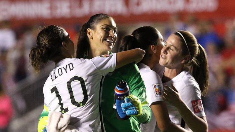 Goalscorer Carli Lloyd celebrates with Hope Solo after the US beat China 1-0 at the Women's World Cup.