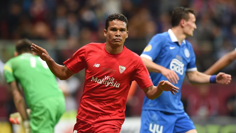 Sevilla's Carlos Bacca reacts after scoring 