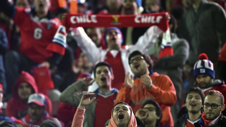 Supporters of Chile cheer for their team before the start Copa America clash with Uruguay