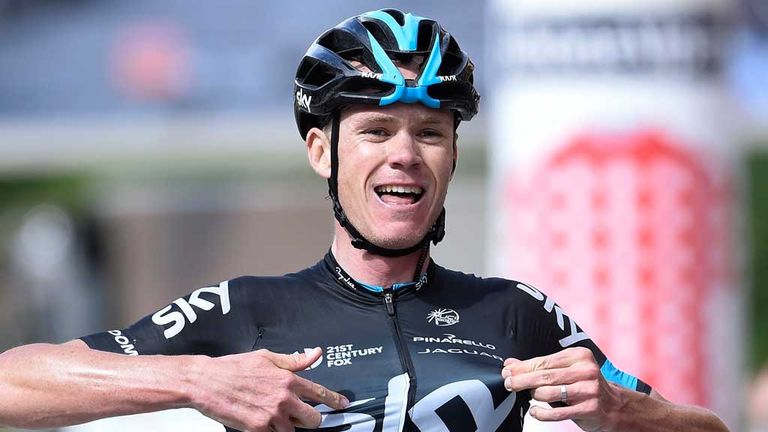 Chris Froome celebrates victory in the final stage of the Criterium du Dauphine