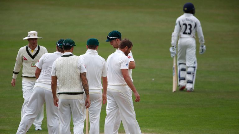Australian players celebrate the wicket of Bell-Drummond