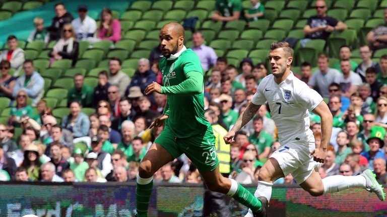 Republic of Ireland's David McGoldrick vies with England's  Jack Wilshere during the international friendly at Aviva Stadium in Dublin on June 7, 2015.