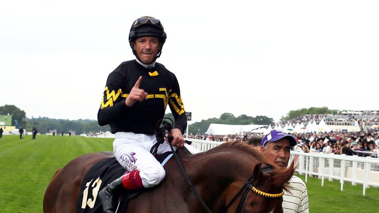 Frankie Dettori celebrates on Undrafted after winning the Diamond Jubilee Stakes