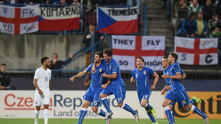 OLOMOUC, CZECH REPUBLIC - JUNE 24: Marco Benassi of Italy celebrates with team mates after scoring to make it 2-0 as Nathan Redmond of England looks on