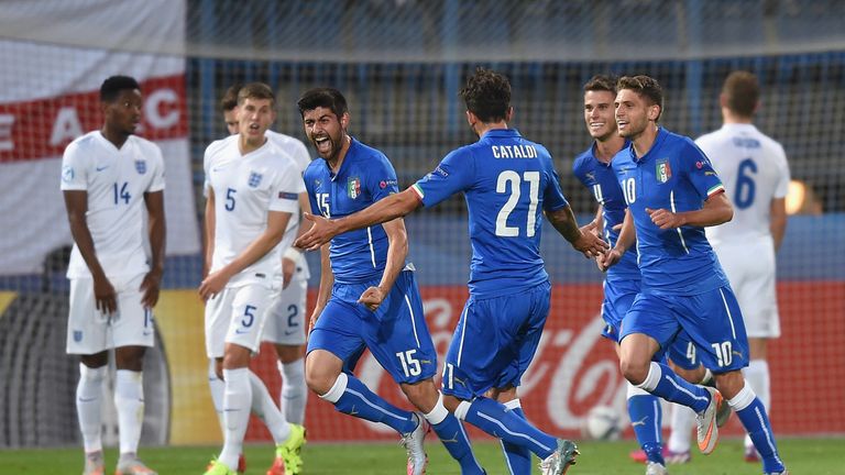 Marco Benassi of Italy celebrates with team mates after scoring to make it 2-0 during the UEFA Under21 European Champio