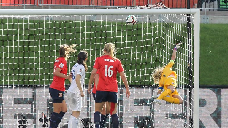 The ball goes past Ingrid Hjelmseth #1 of Norway for a goal by England