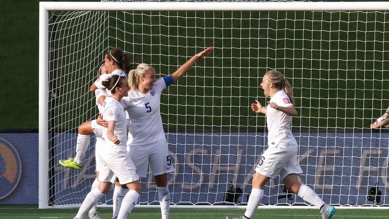 Steph Houghton, Jade Moore and Laura Bassett celebrate England's win against Norway