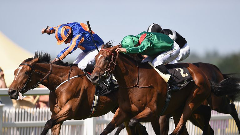 ASCOT, ENGLAND - JUNE 19:  Christophe Soumillion riding Ervedya (Green) beats Ryan Moore riding Found in The Coronation Stakes during Day 4 of Royal Ascot 