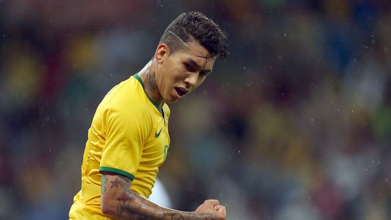 Brazil's Firmino celebrates his goal against Honduras 