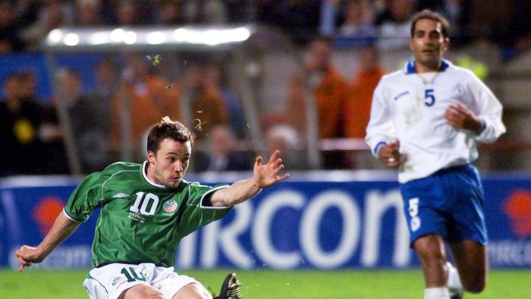 Republic of Ireland's David Connolly scores Ireland's third goal against Cyprus in 2001