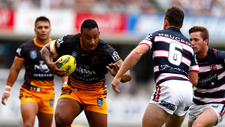 Francis Molo of the Broncos makes a fend