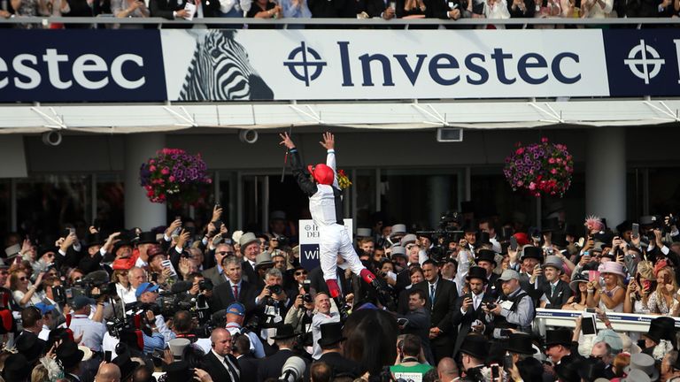 Frankie Dettori does a flying dismount
