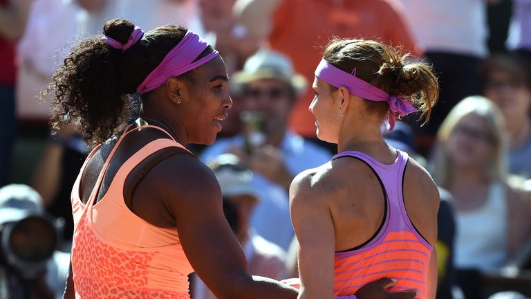 Serena Williams (L) shakes hands with Lucie Safarova at the end of the French Open final