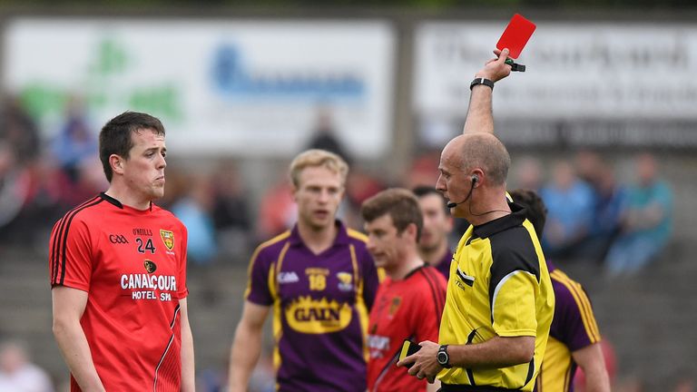 Conor Garvey, Down, is sent off by referee Cormac Reilly