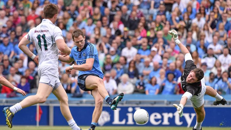 Dean Rock beats Kildare goalkeeper Mark Donnellan, to score Dublin's first goal