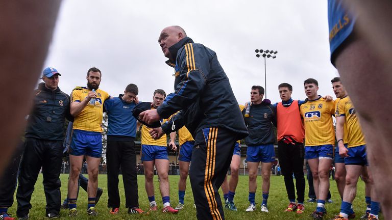 Roscommon manager John Evans with members of the team at the end of the FBD League final