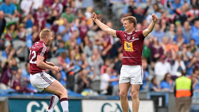 John Heslin, right, celebrates with Denis Glennon after scoring Westmeath's third goal