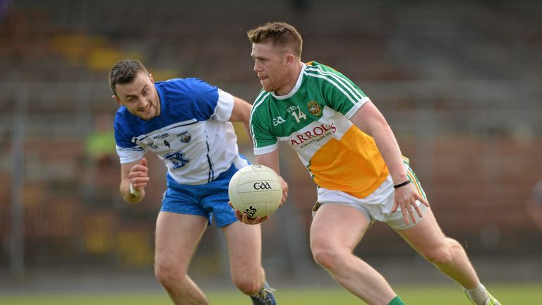 Nigel Dunne, Offaly, in action against Tadhg O Huallachain, Waterford