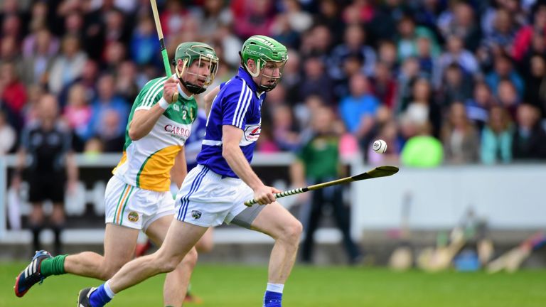 Tommy Fitzgerald, Laois, in action against David King, Offaly